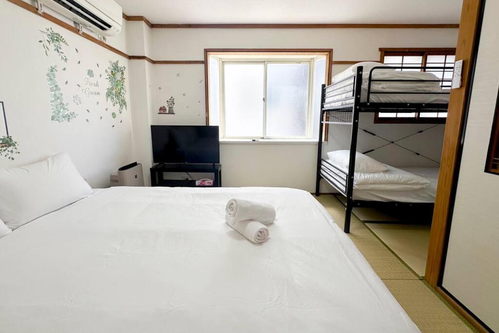 Fotografia 9: ゲストハウスわん弁天町