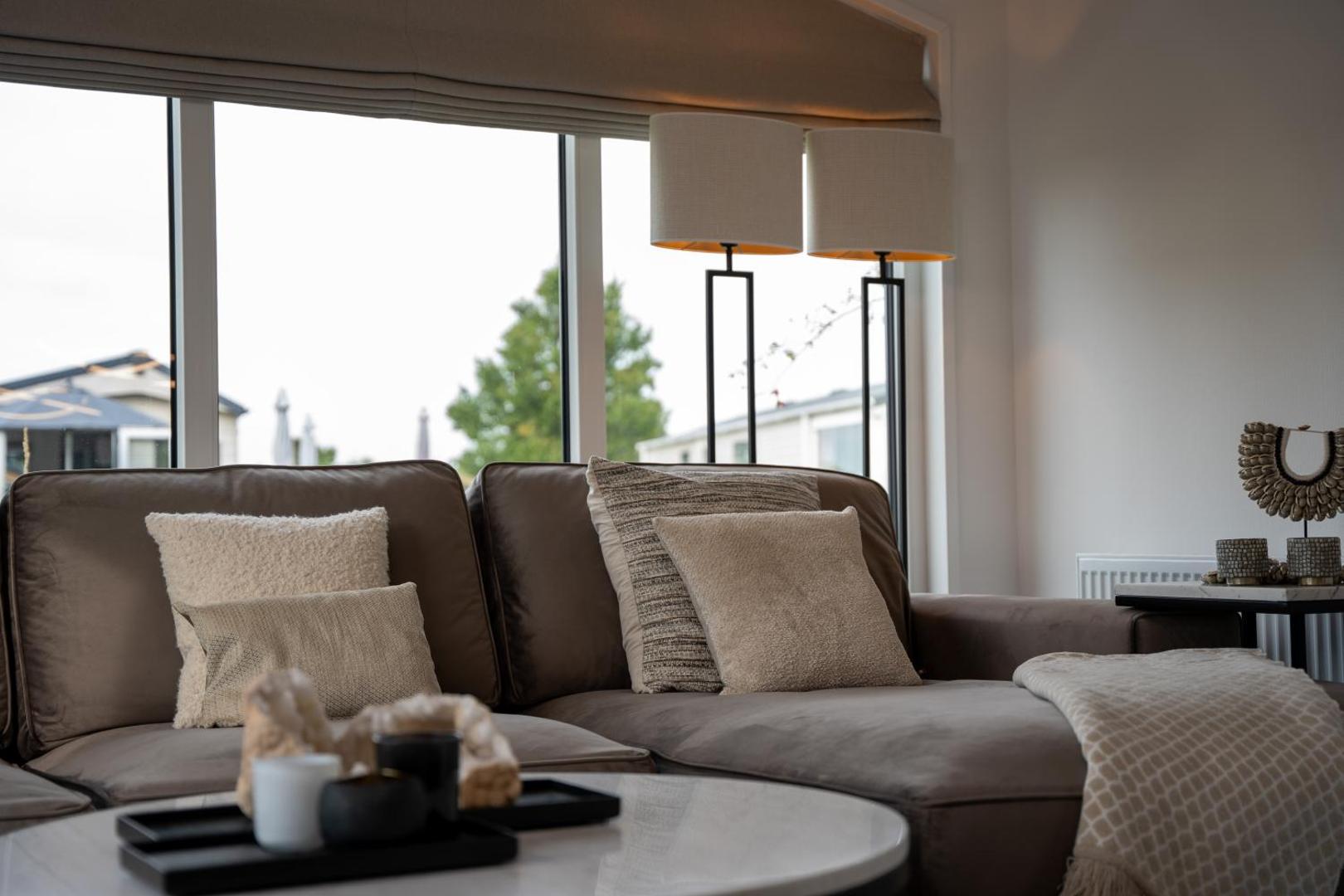 Fotografie 5: Qué Vida, Boutique Chalet aan Zee en Meer