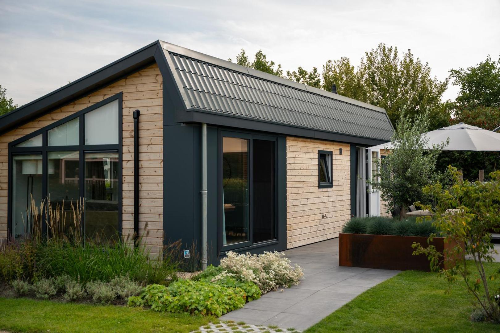 Fotografie 3: Qué Vida, Boutique Chalet aan Zee en Meer