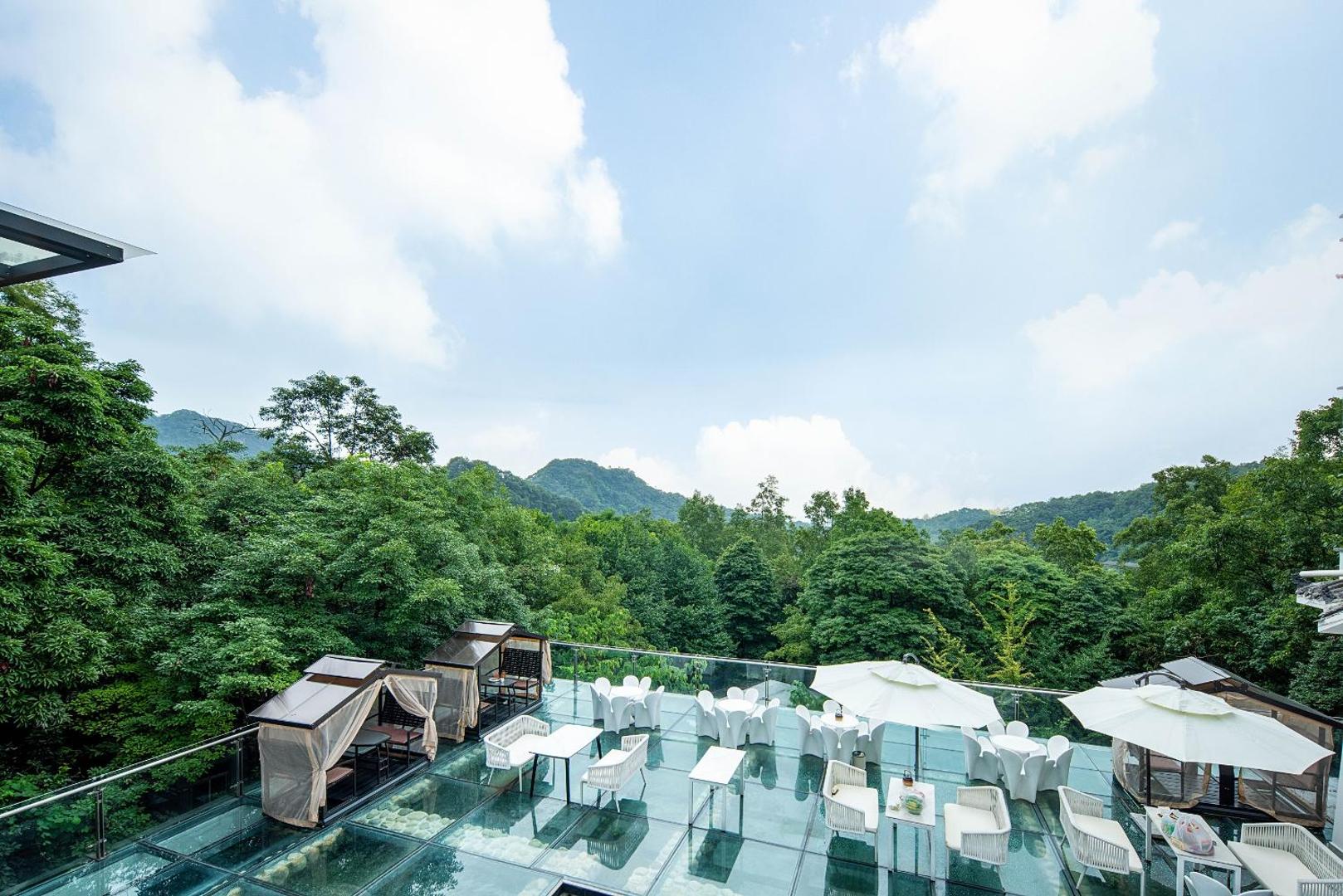 Bilde 6: 都江堰青城山暮山映雪溶洞汤池酒店