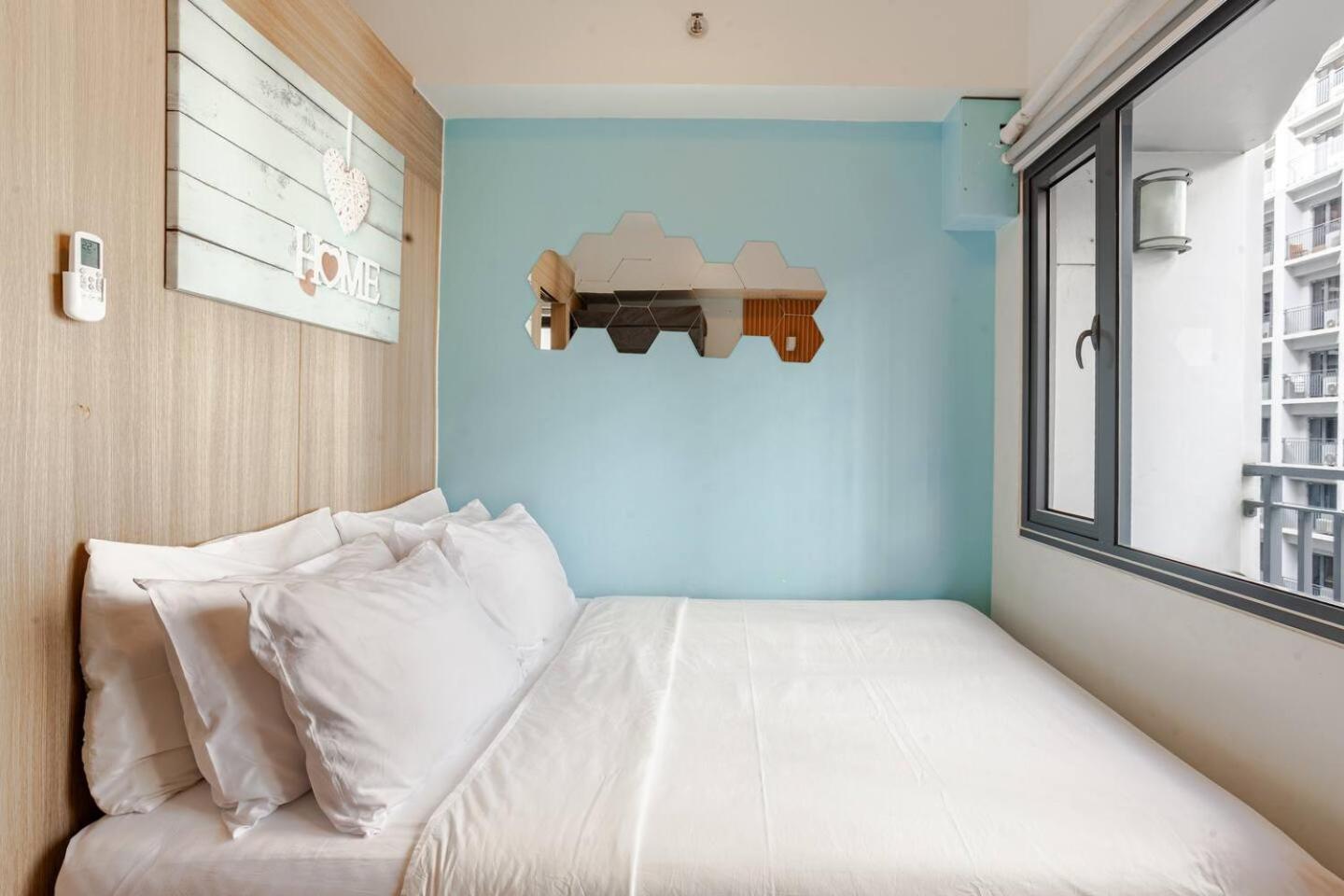 Kuva 3: ClaySky Staycation S2T1-Cozy & Homey 1BR Apartment near MOA facing Pool with Own Parking with Netflix, HBO Max YouTube Premium & up to 200mbps Wifi