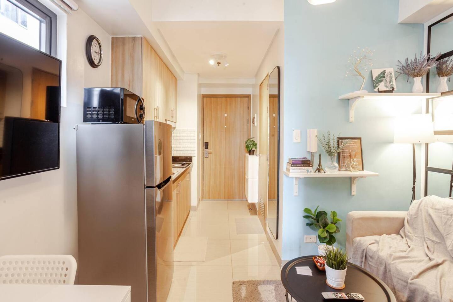 Kuva 8: ClaySky Staycation S2T1-Cozy & Homey 1BR Apartment near MOA facing Pool with Own Parking with Netflix, HBO Max YouTube Premium & up to 200mbps Wifi