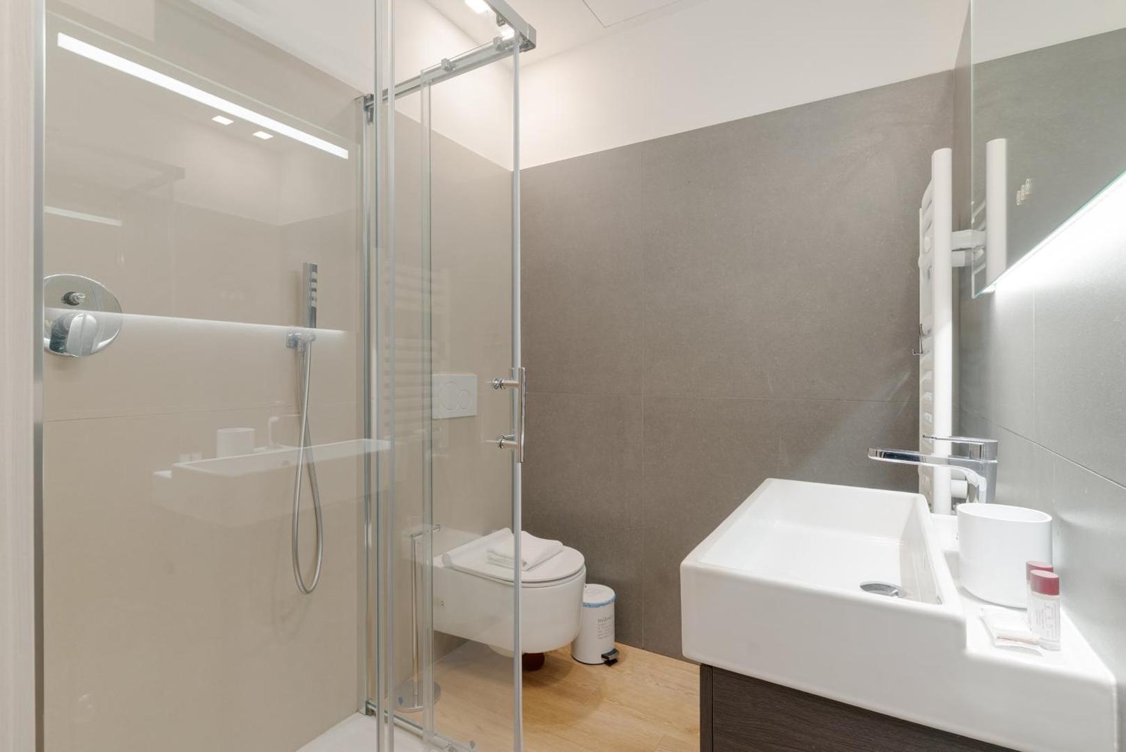 Zdjęcie 5: GuestHost - Stazione Centrale Sleek Apartment