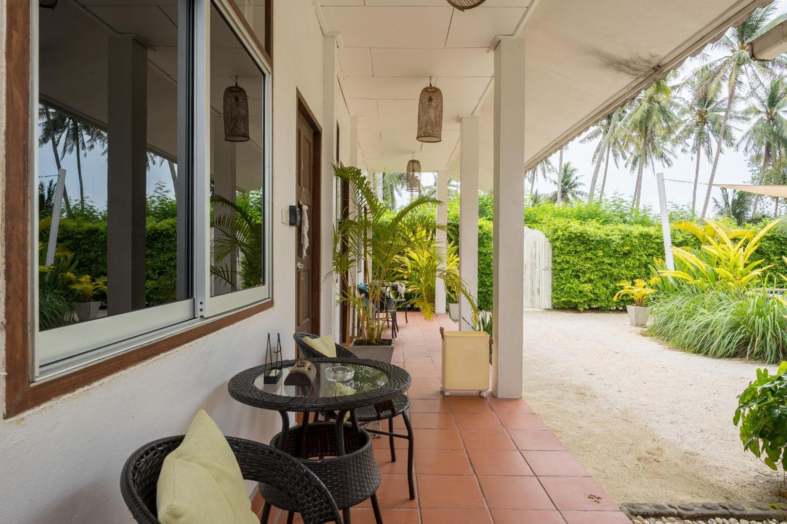 Foto 9: Sun & Sand Bungalows