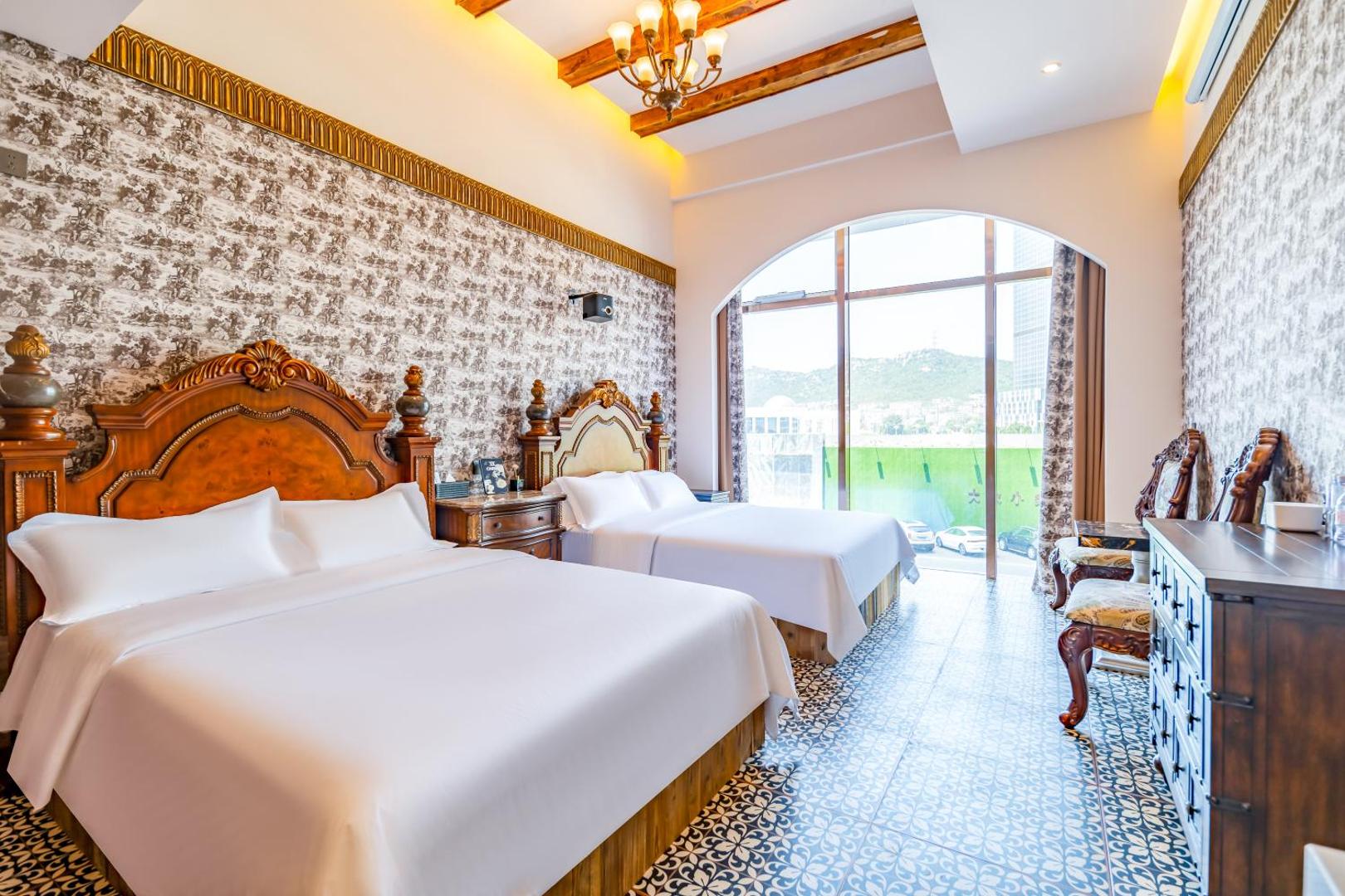 Foto 8: 满月云朝夕民宿酒店
