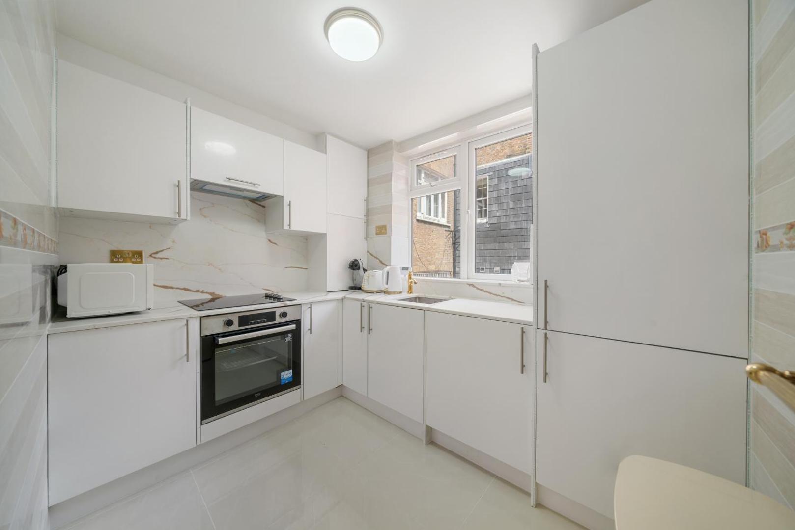 Photo 4 : Chic & Modern 1-Bedroom Apartment in Prime Mayfair H2