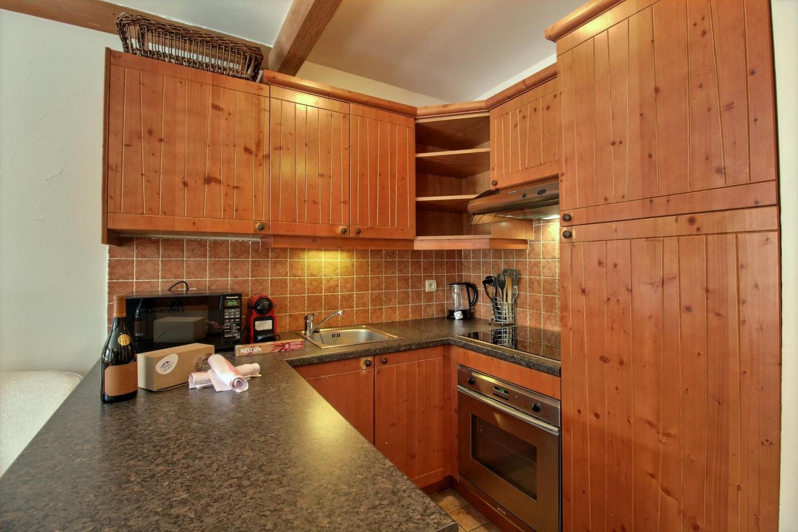 Billede 10: ARC 1950 - Appartement 10 personnes Duplex Cheminée - ski aux pieds - Sauna, Hammam, Jacuzzi, Piscine
