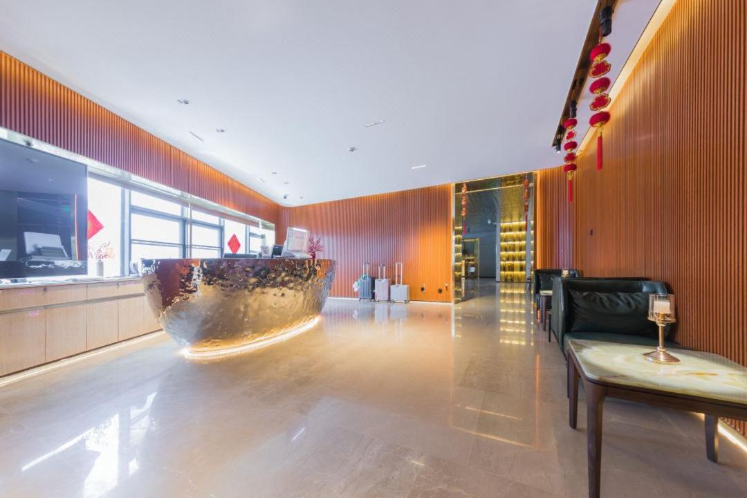 Foto 4: 海口省政府日月广场免税城万信至格酒店