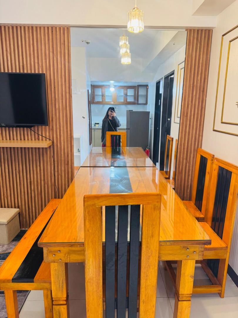Фотография 6: 2BR with Veranda, Unli Netflix, Wifi