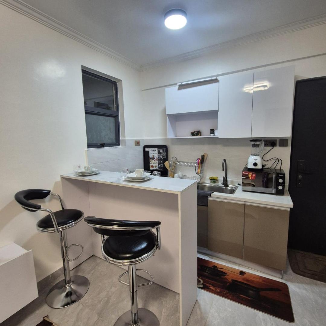 Fotografie 6: Haven 902 - Modern, Stylish & Comfy 1 Bedroom Apartment With Workspace, Secure Parking, CCTV, Restaurant ,Gym, Sauna And City Views in Nairobi, Kilimani Area
