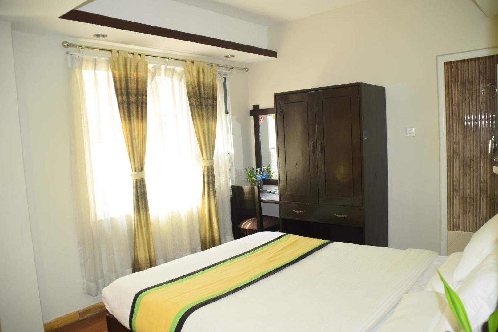 Fotografia 5: Simple & Sustainable- Room with facilities a guest need