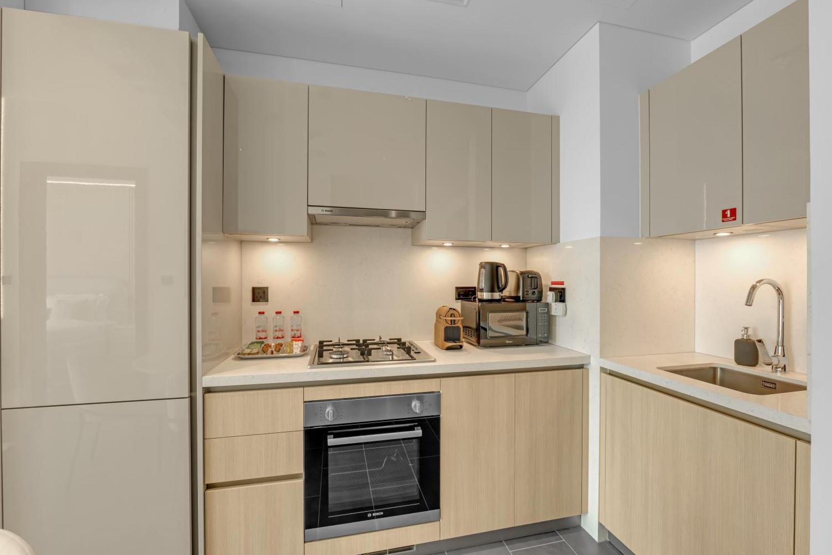 Foto 7: Waves - Modern & Cozy 1BR Apt Close to Down Town Dubai