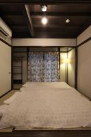 Chambre Lits Jumeaux de Style Japonais avec des Toilettes et une Salle de Bains Communes