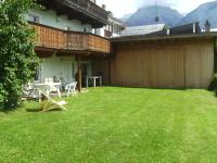  Familienapartment mit Garten (2 Erwachsene + 2 Kinder) 