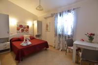 Zimmer mit Queensize-Bett und Meerblick