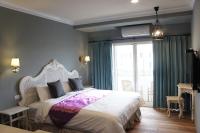 Kamer met Queensize Bed en Balkon