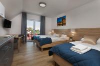 Dreibettzimmer mit Balkon