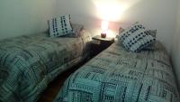 Zweibettzimmer mit eigenem Bad außerhalb des Zimmers