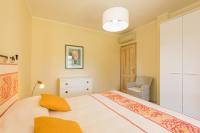 Four- Bedroom Apartment with Garden and Sea View