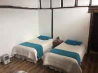 Chambre Quadruple avec Salle de Bains Privative