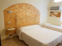 Chambre Deluxe (2 Adultes + 1 Enfant)