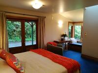 Suite mit Kingsize-Bett mit Whirlpool