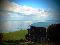 Suite con cama extragrande y vistas al mar