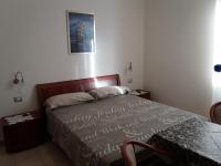 Kamer met Kingsize Bed en Uitzicht op Zee