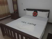 Dreibettzimmer mit Gartenblick