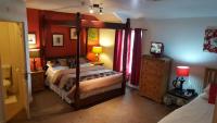 Familiensuite oder Suite mit 2 Einzelbetten und Himmelbett