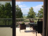 Appartement met uitzicht op het meer