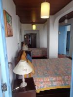 Vierpersoonskamer met Uitzicht op Zee