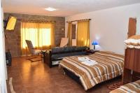 Hostal "El Tomolasta" - Chambres d’hôtes Carolina