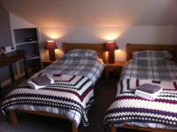 Camera Doppia con Letti Singoli con Doccia