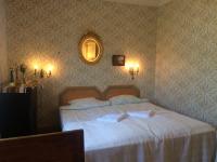 Tweepersoonskamer met 1 of 2 Bedden en Gedeelde Badkamer