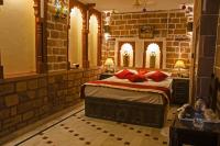 King Suite with Balcony & Fort View