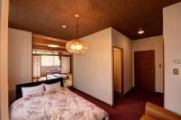 Economy Quadruple Room with Shared Bathroom