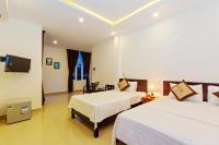 Deluxe Triple Room with Balcony and Garden View
