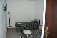 Doppel- oder Zweibettzimmer