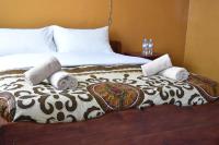 Chambre Lit Queen-Size avec Salle de Bains Privative