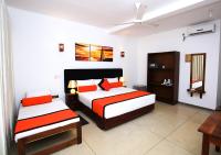 Habitación Triple con vistas al jardín