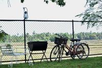 Camera Tripla con Vista Giardino