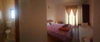 Dreibettzimmer mit Balkon