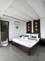 Family Suite Natural Room with Garden Balcony and Pool View