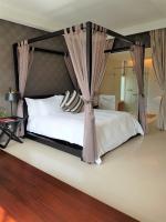 Kamer met Kingsize Bed en Uitzicht op de Tuin