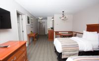 Extended Stay King Suite with One King bed and Two Single Beds - Non-Smoking