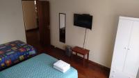 Basic Dreibettzimmer mit Gemeinschaftsbad