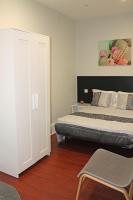 Camera Matrimoniale con Servizi Igienici in Comune