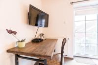 Tweepersoonskamer met 1 of 2 Bedden en Uitzicht op de Tuin