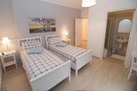 Camera Doppia con Letti Singoli